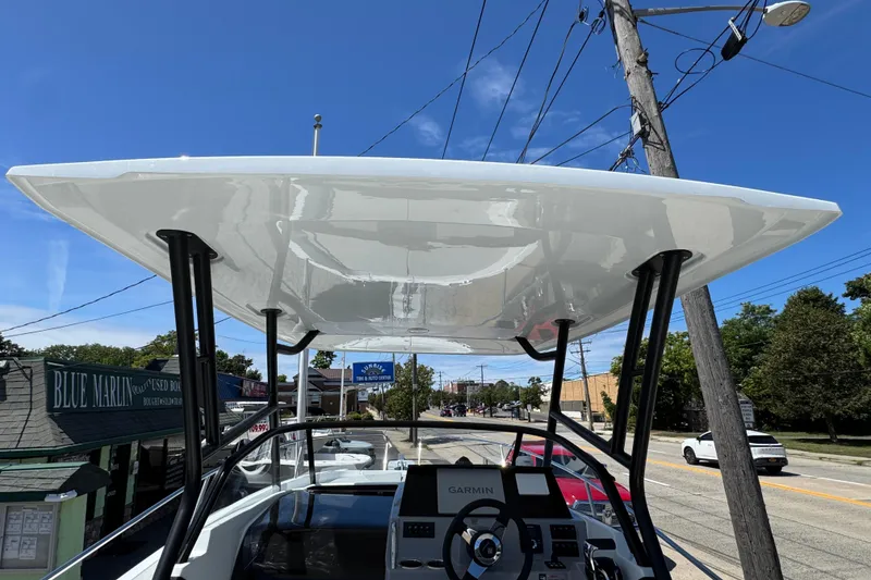 Slide: The Image of 2026 Jeanneau Leader WA 7.5 boat with Garmin navigation, viewed from the helm. - 30