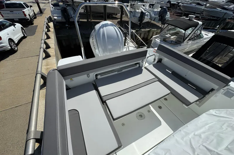 Slide: The Image of 2026 Jeanneau Leader WA 7.5 boat interior with sleek seating and modern design. - 5