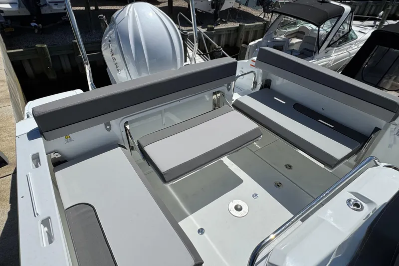 Slide: The Image of 2026 Jeanneau Leader WA 7.5 boat interior with sleek seating and modern design. - 9
