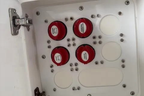 Slide: The Image of 2006 Intrepid 310 Walkaround boat engines, detailed view of dual outboard motors. - 41