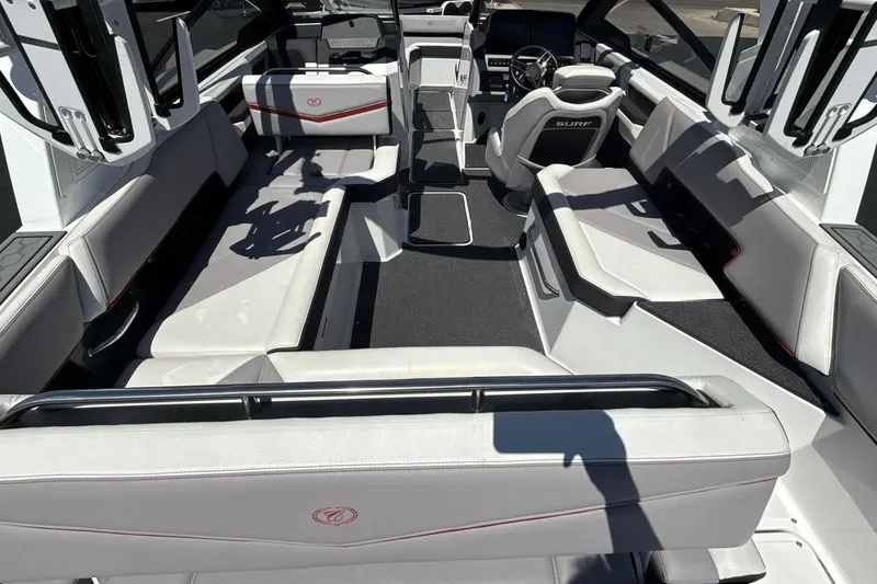 Slide: The Image of 2021 Cobalt R6 Surf boat interior with luxurious seating and modern design. - 12