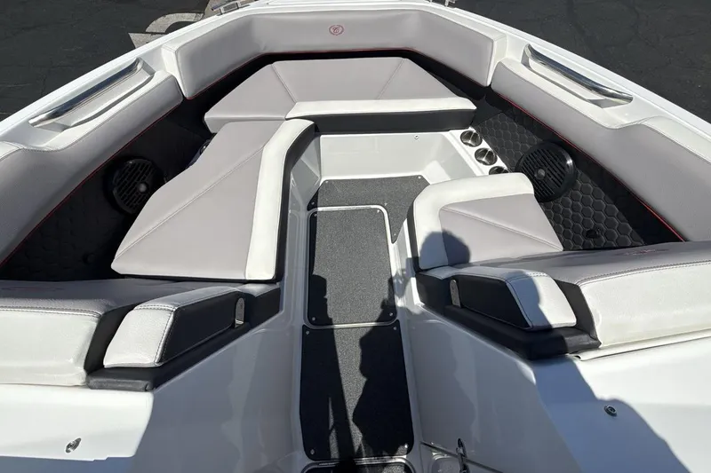 Slide: The Image of 2021 Cobalt R6 Surf boat interior with gray seating and black accents. - 14