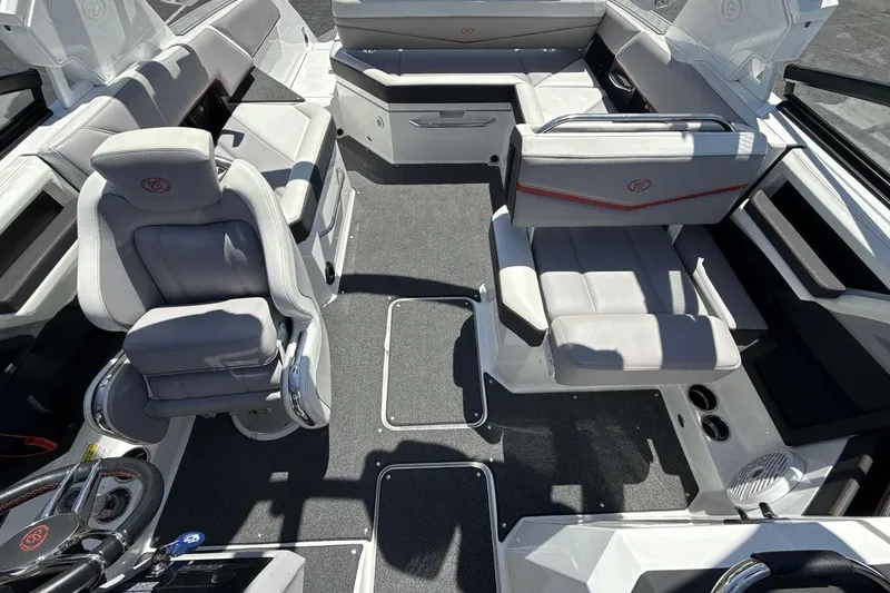 Slide: The Image of 2021 Cobalt R6 Surf boat interior with gray seating and modern design. - 15