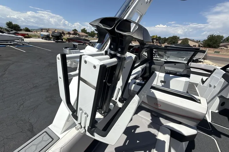 Slide: The Image of 2021 Cobalt R6 Surf boat interior with sleek seating and modern design. - 25