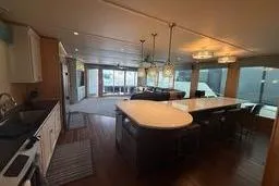 The Image of Spacious kitchen and living area in 2015 STARDUST Oceans Share #2 houseboat. - 1