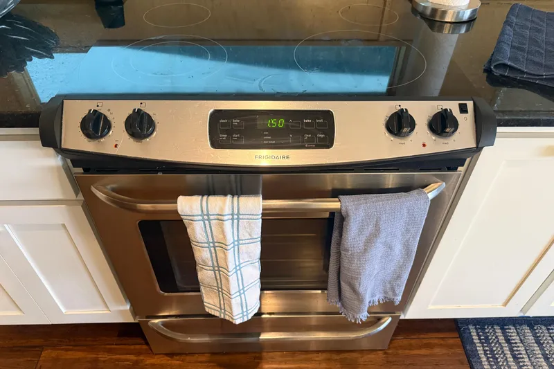 Slide: The Image of Modern kitchen stove with digital display and towels, STARDUST Oceans Share #2, 2015 model. - 13