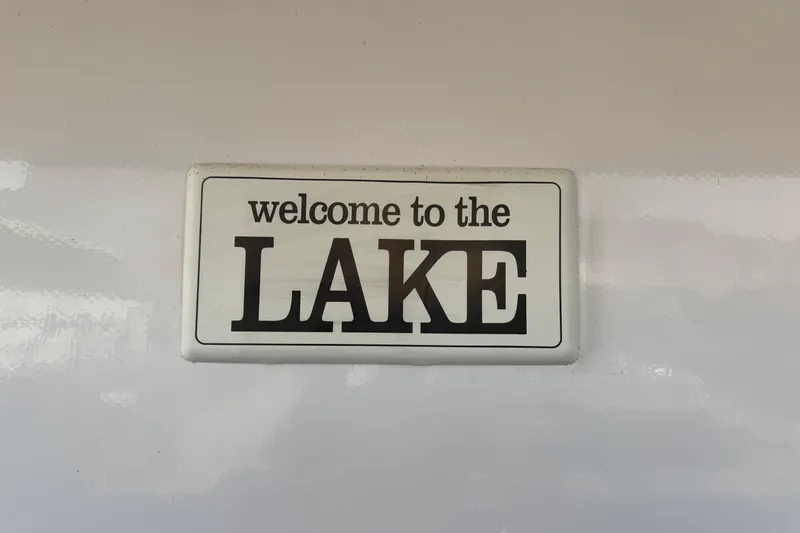 Slide: The Image of "Welcome to the Lake" sign on STARDUST Oceans Share #2, 2015 model. - 27