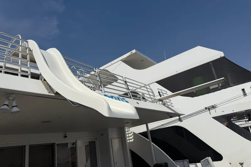 Slide: The Image of Luxury yacht with slide, STARDUST Oceans Share #2, 2015 model, under clear blue sky. - 3