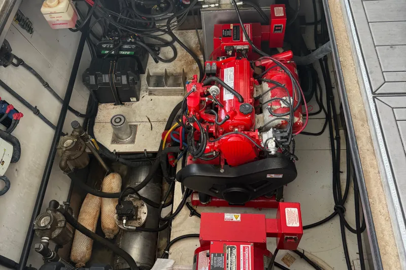 Slide: The Image of Engine compartment of 2015 STARDUST Oceans Share #2 with red machinery and wiring. - 6