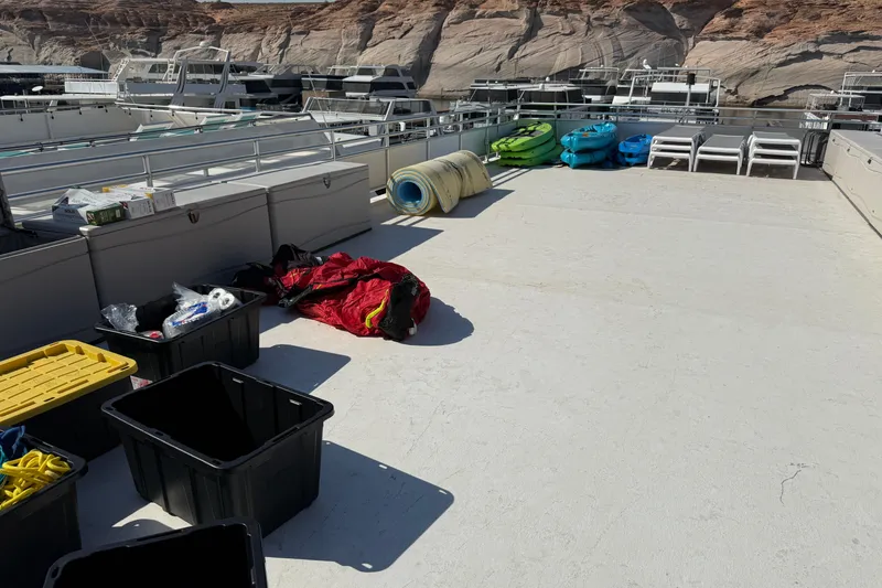 Slide: The Image of Deck of 2015 STARDUST Oceans Share #2 with storage bins and kayaks. - 68