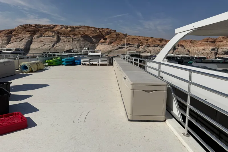 Slide: The Image of Top deck of 2015 STARDUST Oceans Share #2 houseboat with scenic rocky backdrop. - 69