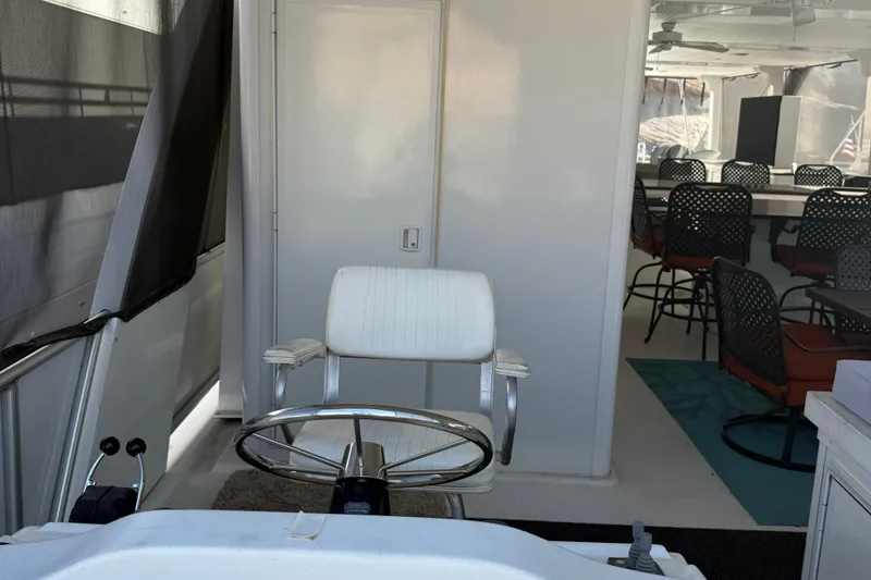 Slide: The Image of Interior of 2015 STARDUST Oceans Share #2 boat with seating and helm chair. - 73