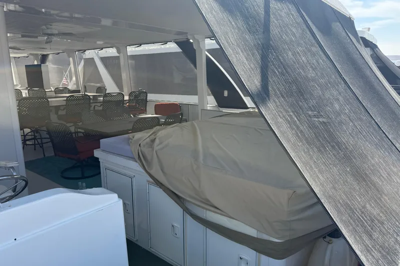 Slide: The Image of Covered outdoor seating area on 2015 STARDUST Oceans Share #2 boat. - 74