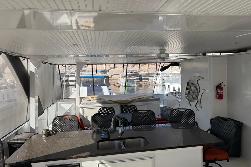 Slide: The Image of Interior of 2015 STARDUST Oceans Share #2 houseboat with kitchen and seating area. - 88