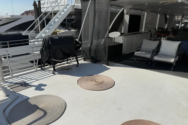 Slide: The Image of Luxury yacht deck with seating, grill, and spiral mats, STARDUST Oceans Share #2, 2015 model. - 98