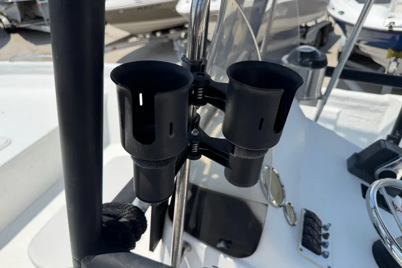 Slide: The Image of Dual cup holders on 2011 Pro-Line 20 CC boat console, featuring sleek design. - 12