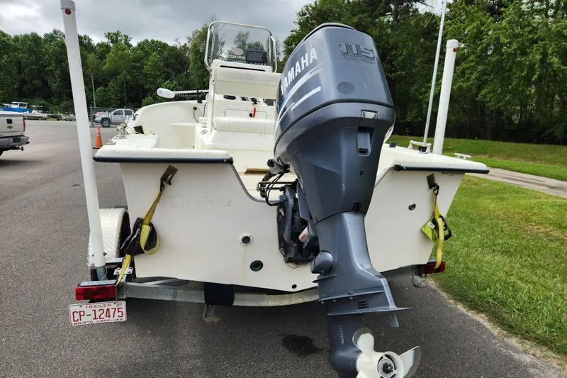 Slide: The Image of 2008 May-Craft 1800 Skiff with Yamaha 115 outboard motor on trailer. - 3
