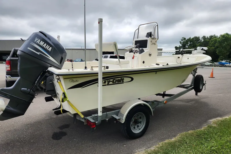 Slide: The Image of 2008 May-Craft 1800 Skiff boat on trailer with Yamaha outboard motor. - 4