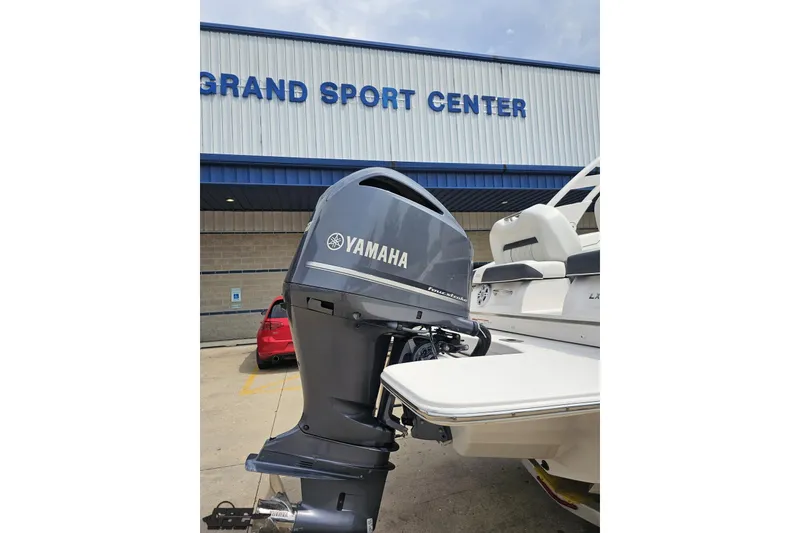 Slide: The Image of 2021 Regal LX4 boat with Yamaha outboard motor at Grand Sport Center. - 28