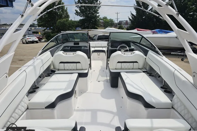 Slide: The Image of 2021 Regal LX4 boat interior with white seating and modern design. - 41