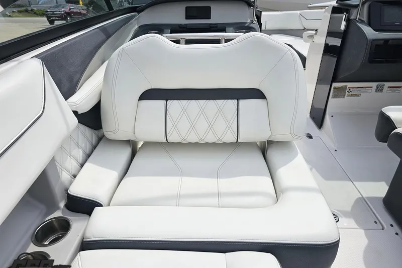 Slide: The Image of Luxurious interior seating of 2021 Regal LX4 boat with white upholstery. - 46