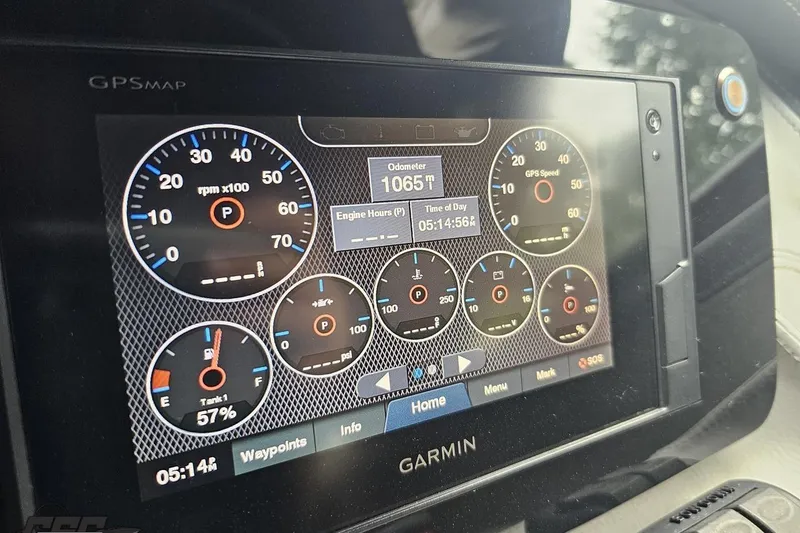 Slide: The Image of Garmin GPS display in 2021 Regal LX4 showing engine metrics and odometer reading. - 70