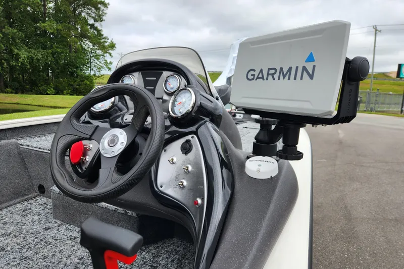 Slide: The Image of 2024 Tracker Pro Team 175 TXW boat dashboard with Garmin navigation system. - 10