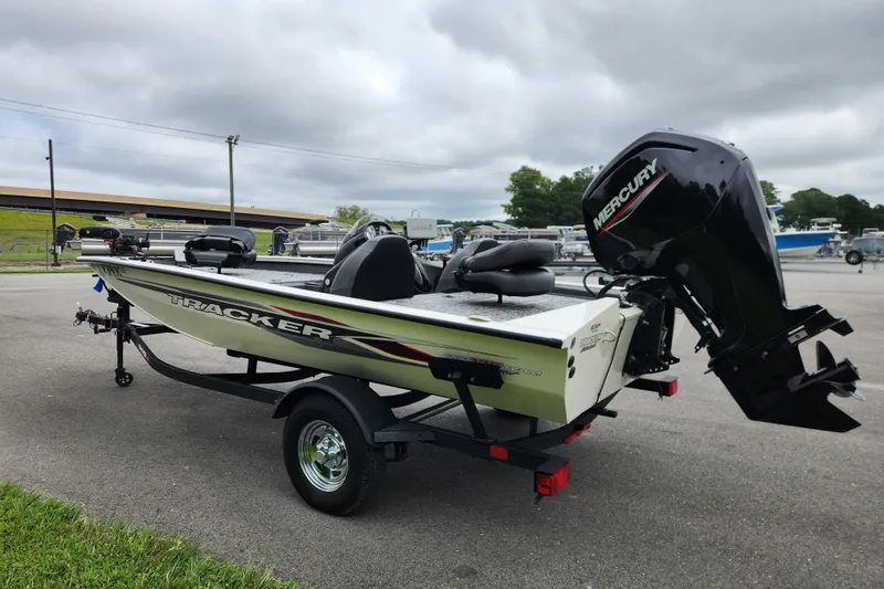 Slide: The Image of 2024 Tracker Pro Team 175 TXW boat with Mercury engine on trailer. - 4