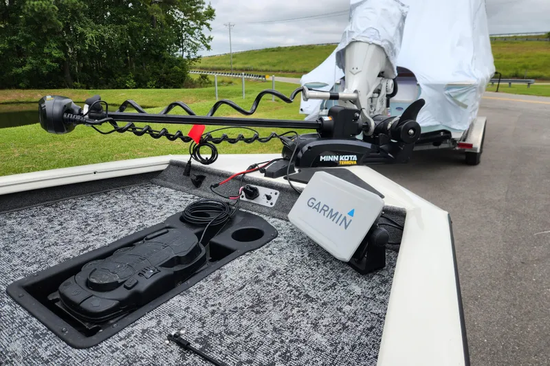 Slide: The Image of 2024 Tracker Pro Team 175 TXW boat with Garmin and Minn Kota accessories. - 8