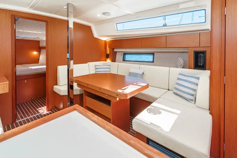 Slide: The Image of Luxurious interior of 2023 Bavaria C42 yacht with elegant wood finish and comfortable seating. - 35