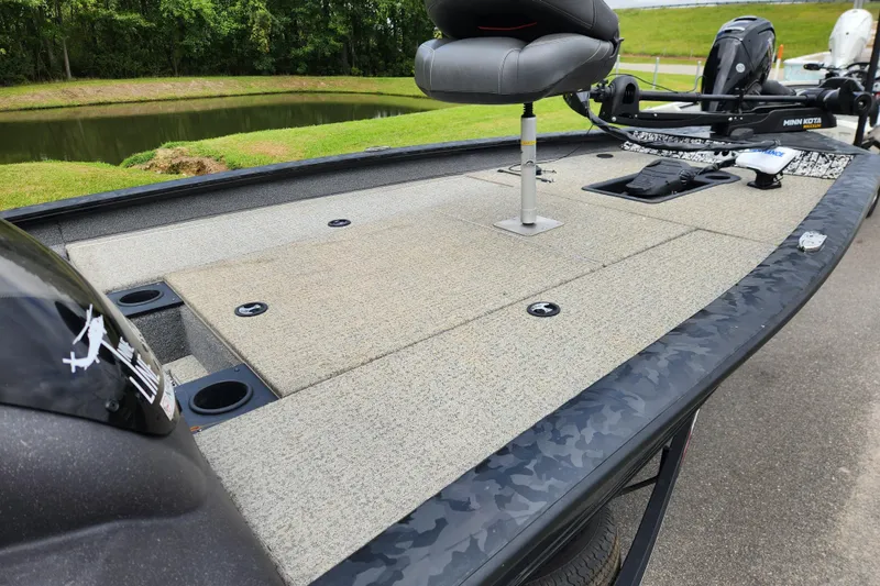 Slide: The Image of 2023 Tracker Pro Team 190 TX fishing boat with spacious deck and seating. - 6