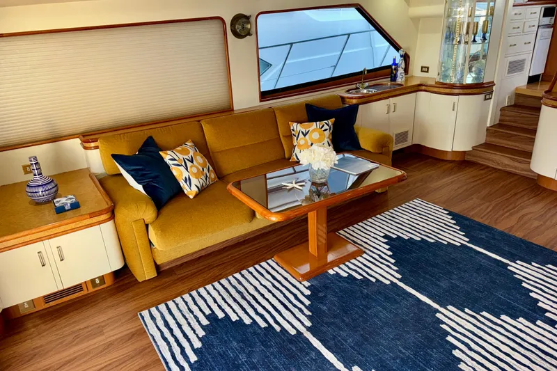 Slide: The Image of Luxurious interior of 1995 Queenship 62 Pilothouse Motor Yacht with elegant furnishings. - 11