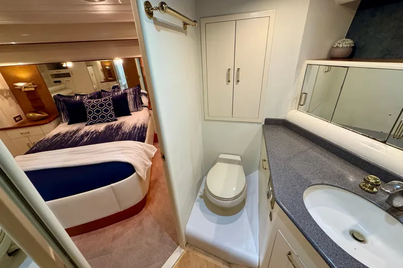 Slide: The Image of Luxurious 1995 Queenship 62 Pilothouse Motor Yacht interior with bedroom and bathroom. - 38