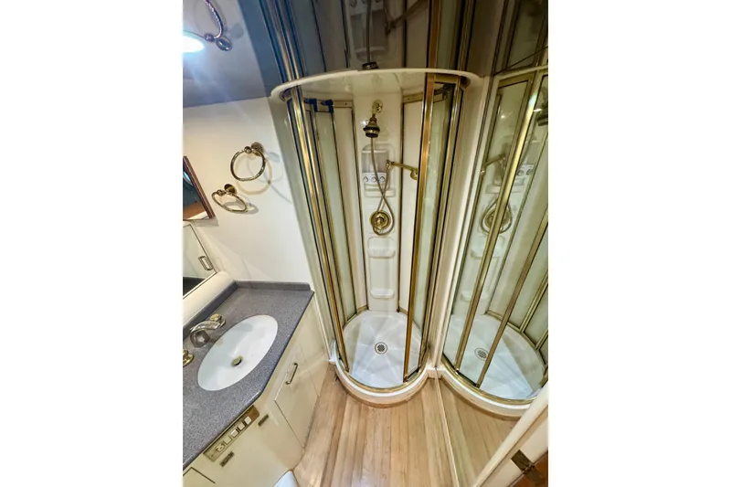 Slide: The Image of Luxurious bathroom in 1995 Queenship 62 Pilothouse Motor Yacht with shower and vanity. - 40