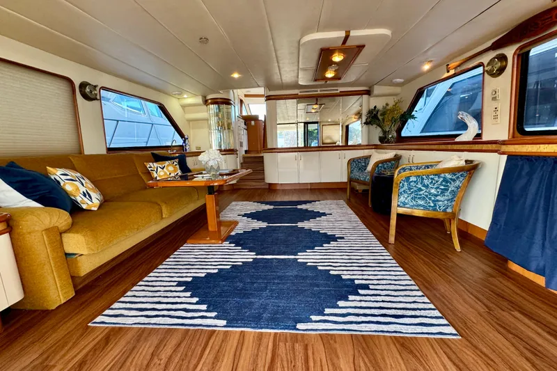Slide: The Image of Luxurious interior of 1995 Queenship 62 Pilothouse Motor Yacht with elegant seating and decor. - 5