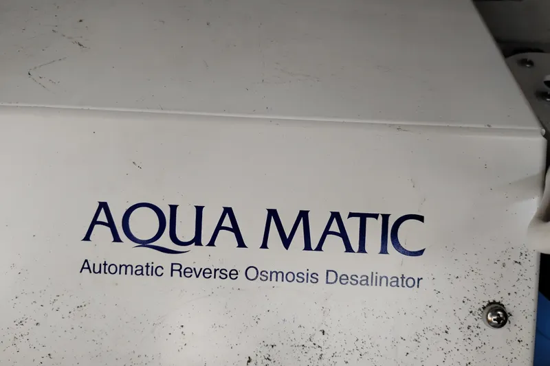 Slide: The Image of Aqua Matic automatic reverse osmosis desalinator on 1995 Queenship 62 Pilothouse Motor Yacht. - 64