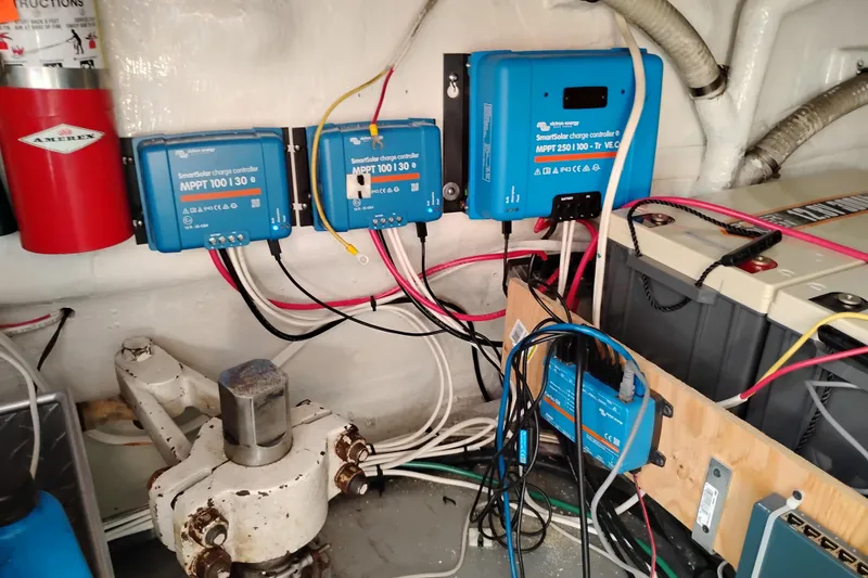 Slide: The Image of Electrical system with solar charge controllers in 1995 Queenship 62 Pilothouse Motor Yacht. - 73