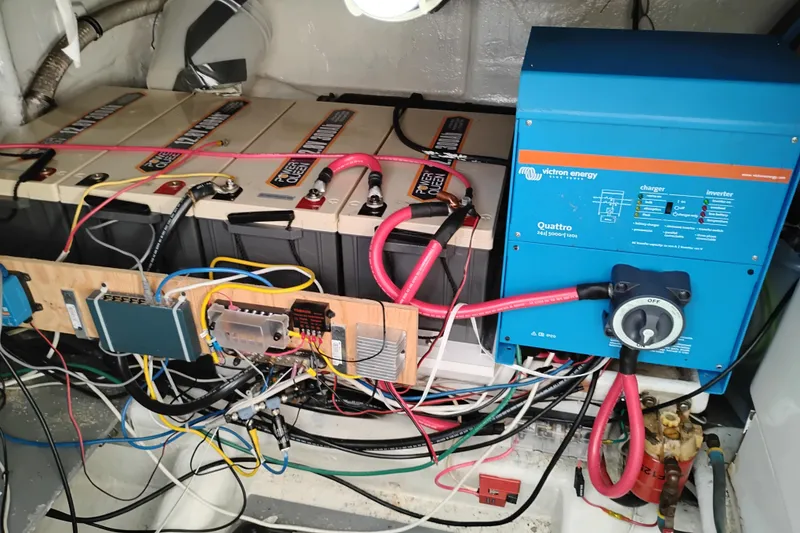 Slide: The Image of Electrical system of a 1995 Queenship 62 Pilothouse Motor Yacht with batteries and inverter. - 74
