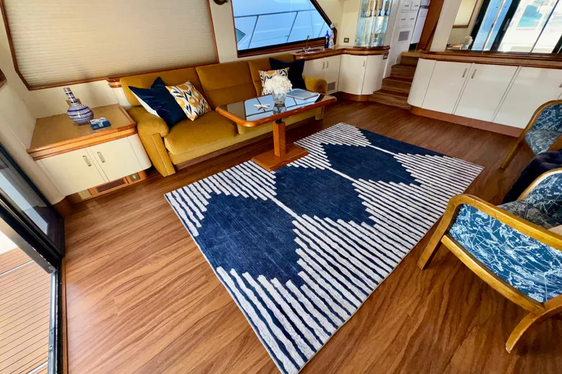 Slide: The Image of Luxurious interior of 1995 Queenship 62 Pilothouse Motor Yacht with elegant furnishings and decor. - 9