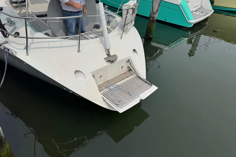 Slide: The Image of Beneteau First 41s5 sailboat, 1989 model, docked with open swim platform. - 15