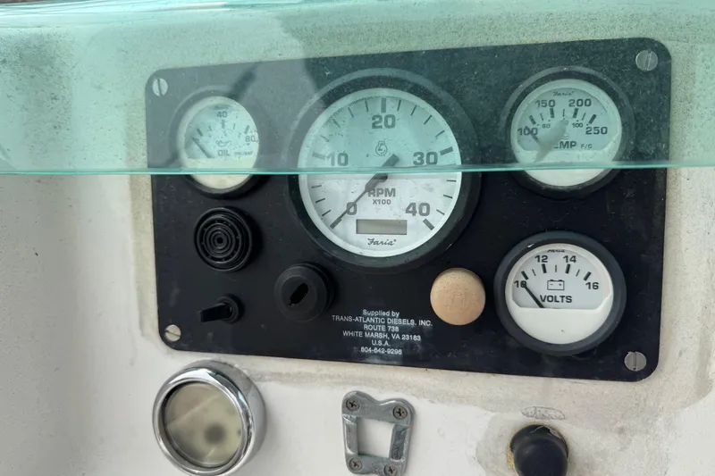 Slide: The Image of Control panel of a 1989 Beneteau First 41s5 sailboat with gauges and dials. - 21