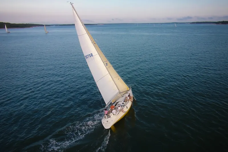 Slide: The Image of Sailing yacht Beneteau First 41S5 from 1989 gliding on open water. - 34