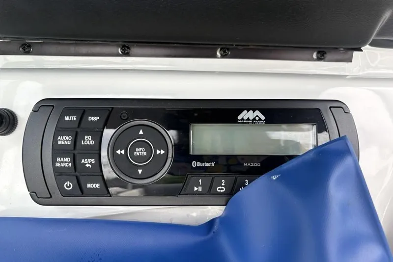 Slide: The Image of 2017 Yamaha Boats SX195 marine audio system with Bluetooth and control panel. - 16