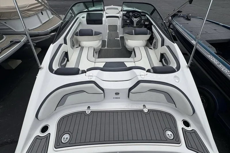 Slide: The Image of 2017 Yamaha Boats SX195 interior with sleek seating and modern dashboard design. - 29