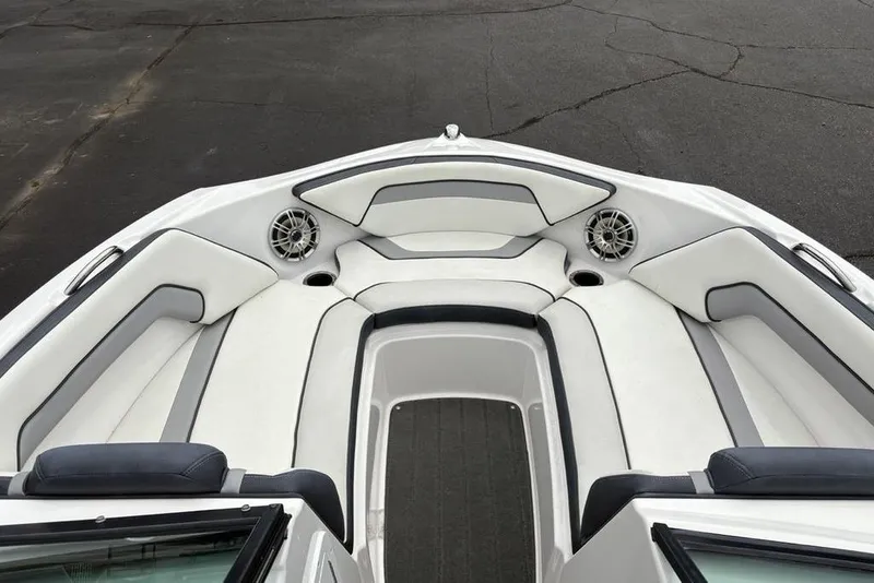 Slide: The Image of 2017 Yamaha Boats SX195 interior with white seating and speakers. - 4