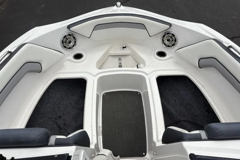 Slide: The Image of 2017 Yamaha Boats SX195 interior with cushioned seating and speakers. - 5