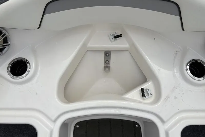 Slide: The Image of 2017 Yamaha Boats SX195 interior detail with cup holders and speaker. - 6