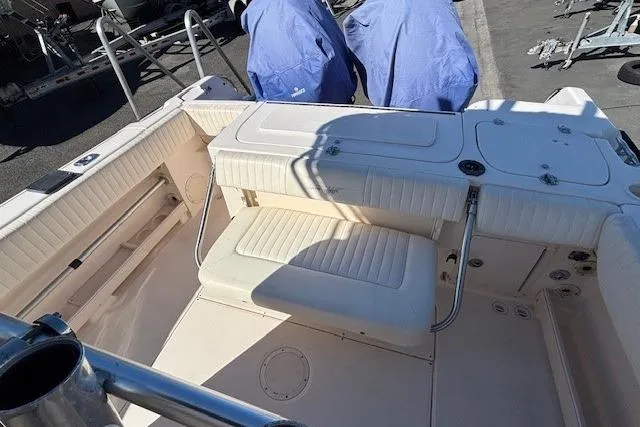 Slide: The Image of 2005 Grady-White Advance 257 boat interior with seating and storage compartments. - 15