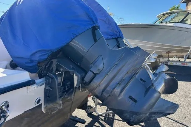 Slide: The Image of 2005 Grady-White Advance 257 boat storage compartment with lockable hatch. - 25