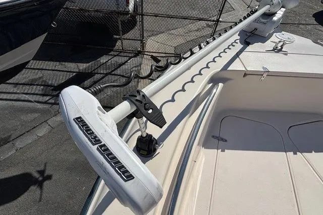 Slide: The Image of 2005 Grady-White Advance 257 boat bow with anchor storage and trolling motor. - 8